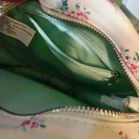Mint green with detail silk lining.Round Purse with over shoulder and hand strap - Picture 9 of 10